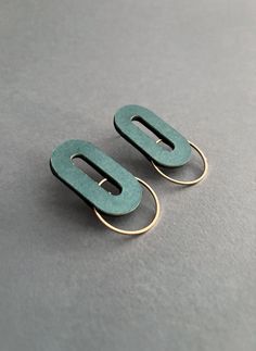 Geometric design paper stud earrings, oval shape with a small gold metal circle. An innovative shape for these beautiful modern earrings. They are handmade with precious green pearl effect paper, a jewel never seen before, a fantastic gift idea for those who want to wear everyday design jewellery. Made to order If you have any questions, do not hesitate to contact me. I would gladly help you with any kind of issues or concerns. The jewel will be delivered in a nice gift box. ● DETAILS Material: Metal Circle, Oval Earrings, Design Paper, Green Pearls, Paper Jewelry, Oval Earring, Earrings Green, Jewelry Making Tutorials, Women's Jewelry And Accessories