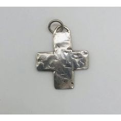 This stunning set of six handcrafted antique cross pendants showcases unique styles inspired by Native American design, all made from sterling silver. Each piece is attributed to T. Foree, though they are not signed by the designer.  Dimensions: Largest Cross: 3.75" H x 1.75" W Unique Sterling Silver Cross Necklace, Handmade White Gold Cross Jewelry, Hand Forged Silver Cross Pendant Necklace, Hand Forged Silver Cross Necklace, Handmade Silver Cross Pendant Jewelry, Unique Silver Cross Pendant Necklace, Unique Silver Necklace With Cross Pendant, Hand Forged Silver Cross Pendant Jewelry, Symbolic Large Cross Pendant Jewelry