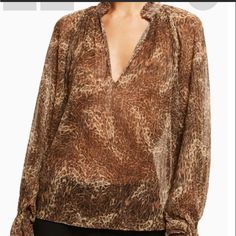 Nwt Ramy Brook "Jolene" Blouse In Jewel Leopard Print Accented With Metallic Flecks. Sz Xs Approx. 25"L From Shoulder To Hem Band Collar; Two-Button Front Long Balloon Sleeves; Elastic Flare Cuffs Easy Fit Polyester/Metallic Dry Clean Silk Fabrics, Lively Colors, And Sophisticated Silhouettes. Blouse In Brown Leopard With Sheer Printed Design, Ruffled Neck, Blouson Sleeves, And Gathered Cuffs Approximately 24in From Shoulder To Hem Model Is 5'10 And Is Wearing A Size Small. Measurements May Vary Elegant Brown V-neck Blouse, Brown Blouse With Blouson Sleeves For Fall, Elegant Brown Blouse For Night Out, White Peasant Blouse, Overlay Blouse, White Silk Blouse, Lavender Blouse, Mesh Sweater, Lace Blouse Long Sleeve