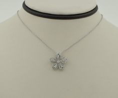 Beautiful handmade 14K solid white gold round cut natural diamonds flower pendant on 14K solid white gold cable chain necklace. Made by Gabriel & Co. Would be a perfect wedding/ anniversary gift for the one you love! Chain measures approx.: 18.5 inches. Chain thickness approx.: 0.95mm Pendant measures approx.: 13.45mm x 13.3mm Total diamond weight approx.: 0.40 ct  Total necklace weight approx.: 3.4g Hallmarks: 14K Gabriel & Co. SO82837 Will be placed into a suitable gift box. Free shipping with Diamond Jewelry With Flower Charm For Anniversary, Diamond Flower Charm Jewelry For Anniversary, Flower Shaped Diamond Necklace For Anniversary, Flower-shaped Diamond Necklace For Anniversary, Elegant Platinum Flower Jewelry, Elegant Flower-shaped Platinum Jewelry, Diamond White Flower Shaped Platinum Jewelry, Anniversary Diamond Necklace With Flower Pendant, Wedding Necklace With Single Cut Diamonds In Flower Shape