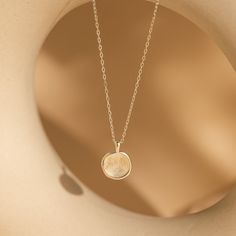 Capture cherished moments with our Fingerprint Coin Necklace, delicately shaped in a circle. Each necklace comes with a pressed circle charm, engraved with an actual fingerprint design, serving as a heartfelt tribute to love and connection. A thoughtful choice for Mother's Day, this necklace embodies the enduring beauty of maternal love, offering a timeless and meaningful gift for the special woman in your life. SKU: MM-NM144NI Product Details Material: High Quality Solid 925 Sterling Silver Fin Elegant Round Locket Necklace For Mother's Day, Elegant Round Locket Necklace With Birth Flower, Elegant Round Pendant Locket Necklace With Birth Flower, Elegant Birth Flower Round Pendant Locket Necklace, Dainty Sterling Silver Round Locket Necklace, Dainty Medallion Charm Necklace As Keepsake, Minimalist Pendant Charm Necklace For Keepsake, Minimalist Birth Flower Necklace Keepsake, Minimalist Round Pendant Charm Necklace For Anniversary