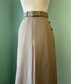 sample sale! vintage-style, left-sided buttoned wide-leg pants with belt. It is  medium-weight herringbone fabric.  It is a beautiful fabric from Japan and has nut buttons. great work style. This is not a modern style of pants. I used a 1930s-1940s vintage pattern. *Measurements Waist- great for 27-28"actual waist measurement Hip-great for 36" Pants total length-43.5" Pants width-11.5" Inseams-31" Front rise-13"(under waist band to crotch) Back rise-14 1/8"(under waist band to crotch) Great for Beige Wide Leg Pants With Belt Loops, Formal Beige Wide Leg Pants With Belt Loops, Formal Beige Belted Bottoms, Beige Wide Leg Tailored Pants, Khaki Wide Leg Workwear Pants With Belt Loops, Khaki Wide Leg Pants For Work With Belt Loops, Tailored Beige Bottoms With Belt Loops, Classic Beige Wide Leg Pants With Belt Loops, Khaki Belted Workwear Bottoms