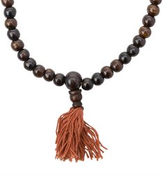 Malas are Tibetan rosaries, traditionally used for special Buddhist practice. Because Tibetan Buddhism suggests that there are 108 negative emotions to overcome, malas such as this Bone Counter Japa Mala are strung with 108 beads, one bead for each mantra. Features: Strung bone beads. Finished with a cotton tassel ends and bone beads. Use for meditation or spiritual practice. Details: Designed In: Nepal Material(s): Bone Dimensions: 28" Keywords: japa, japa mala, malas, rosary, bone, Nepal, medi Spiritual Wooden Beaded Healing Bracelets, Bohemian Mala With 108 Beads For Blessing, Bohemian 108 Beads Mala For Blessing, Hand-strung Brown Beaded Bracelets For Meditation, Brown Hand-strung Beaded Bracelets For Meditation, Spiritual Brown Beaded Bracelets, Bohemian Hand-strung Healing Rosary, Hand-strung Spiritual Beads For Blessing, Bohemian Hand-strung Rosary For Healing