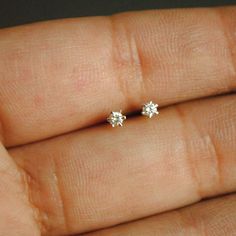 Pretty little things - perfect Christmas gifts! For baby girls, sisters, mother as well as all the guys who like jewelry! * Diamond Wt/Diamond Size (each stud): (Please select from 'Diamond Size' dropdown) > 0.01 ct / 1.3mm > 0.02 ct / 1.7mm > 0.03 ct / 1.95mm > 0.04 ct / 2.1mm > 0.05 ct / 2.3mm > 0.06 ct / 2.5mm > 0.07 ct / 2.6mm > 0.08 ct / 2.8mm > 0.09 ct / 2.9mm > 0.10 ct / 3.0mm * Diamond - H Color, Vs-Si Purity * Gold - 14K Solid Yellow Gold. (other colors ava Newborn Diamond Earrings, Baby Diamond Earrings, Yellow Gold Diamond Earrings With Birthstone, Dainty White Diamond Earrings With Brilliant Cut, Tiny Diamond Earrings For Everyday, Tiny Cubic Zirconia Jewelry For Anniversary, Minimalist 14k Gold Diamond Earrings With Prong Setting, Delicate Round Diamond Earrings With Single Diamond, Everyday Tiny Diamond Earrings