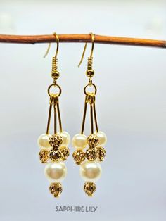 Gold Plated Pearl Beaded Earrings, Small Dangle Earrings, Dainty Gold Plated Pearl Bead Earrings, Bridesmaid Earrings, Gift for her These are so dainty, light weight and comfortable enough for all day wear. 5.6cm long, from the top of the earwire to the bottom of the dangles. Your earrings will arrive with a pair of little rubber stoppers for the earwires so you won't lose your earrings. Perfect gifts for someone special, Wedding, Birthday, Anniversary, Christmas, Graduation, or a treat for your Dangle Pearl Earrings With Dangling Beads For Party, Metal Beaded Drop Earrings With Pearl, Party Drop Pearl Earrings With Dangling Beads, Party Pearl Drop Earrings With Dangling Beads, Formal Beaded Dangle Earrings, Beaded Metal Drop Pearl Earrings, Metal Dangle Beaded Earrings With Pearl Drop, Pearl Beaded Earrings With Dangling Beads For Party, Adjustable Gold Pearl Earrings For Party