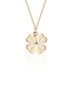 Aurelia Demark's signature Medium Four Leaf Clover pendant will bring you luck and style. This pendant is handcrafted from 18K yellow gold and embellished with a center emerald. Looks great worn alone or layered with your other favorite pendants. 18k Yellow Gold Diameter: approx .78" in diameter Total Carat Weight: 0.015 (approximately) Emerald stone Made in NYC Chain sold separately Styled at The Jewel Box with a 16" Mini Aurelia Chain. Four Leaf Clover Jewelry, Pendant Ideas, Clover Jewelry, Four Leaf Clover Necklace, Clover Pendant, Clover Necklace, Wardrobe Outfits, Four Leaves, Hinged Bracelet