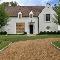 a large white house with lots of windows