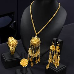 Include: Necklace, Bracelet,Earrings, Right (Ring is adjustable) Material : ZInc Alloy with Gold-Plated Make a stunning statement on your special day with this Dubai Gold Necklace Jewelry Set.  FAQs: 1,Do you have fast shipping method? If you need your order urgently and want it to be delivered through expedited express shipping, please add the item to your cart and check the expedited shipping option. We usually ship items within a few days of receiving the order. 2,Do the photos reflect 100% o Adjustable Gold Jewelry Sets For Celebration, Dubai Gold Necklace, Wedding Necklace Set, Gold Jewelry Necklace, Gold Necklace Set, Fashion Jewelry Sets, Matching Accessories, African Wedding, Necklace Earring Set