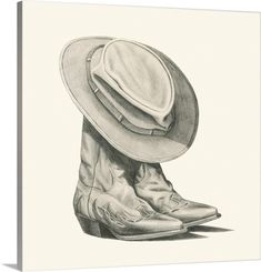 a drawing of a cowboy's boot with a hat on its head and boots underneath it