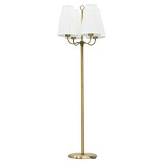 a floor lamp with two lamps on it