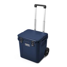 a blue cooler with wheels and handle on a white background, it is isolated from the side