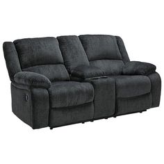 the reclining loveseat has two seats and is made from dark gray fabric