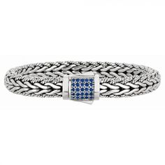 A thick wheat chain of textured and polished silver with a push-button clasp studded with sapphires. Length: 8.25" Royal Chain, Woven Chain, Woven Bracelet, Black Sapphire, Italian Jewelry, Sapphire Bracelet, Woven Bracelets, Fine Jewelry Designers, Design Silver