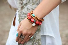 Coral Boho Statement Bracelet Bali Sterling Silver, Beadwork Bracelet, Bohemian Bracelet, Persimmon Coral Bright Colorful Stacking Bracelet This gorgeous coral is color enhanced to a perfect salmon / persimmon hue and is full of beautiful sunbursts They have a rustic natural texture and organic variations in each one. They have been paired with lovely Bali sterling silver zipper disks and a Bali sterling silver focal bead. This is the perfect statement bracelet for stacking with other boho pieces in my collection! I guarantee my elastic for life. Accidents can happen. Let me fix it for you! I want you to enjoy this bracelet for a long, long time. IMPORTANT: To get the best fit possible, please leave your exact wrist measurement in the comments section at checkout. The best way to measure y Bohemian Orange Beaded Bangle Bracelets, Bohemian Orange Beaded Bangle Bracelet, Orange Bohemian Beaded Bangle Bracelet, Orange Bohemian Bangle Jewelry, Bohemian Orange Bangle Jewelry, Bohemian Orange Beaded Bracelets With Round Beads, Orange Bohemian Bracelets For Festivals, Bohemian Orange Bracelets For Festivals, Bohemian Orange Hand-strung Bracelets