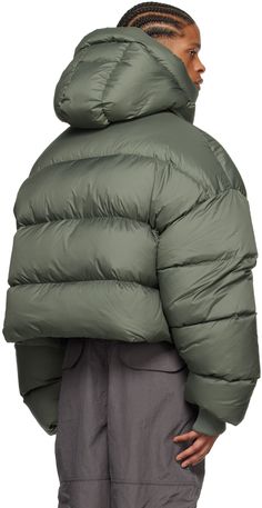 Lightweight down-filled quilted polyester taffeta jacket. · Bungee-style drawstring at hood · Zip closure with velcro placket · Welt pockets · Concealed bungee-style drawstring at hem · Concealed rib knit cuffs · Zip pocket at interior · Full nylon taffeta lining Fill: 90% duck down, 10% duck feather. Supplier color: Moss Quilted Nylon Hooded Jacket For Streetwear, Sporty Nylon Puffer Parka, Sporty Hooded Duck Down Puffer Jacket, Urban Nylon Puffer Jacket With Detachable Hood, Functional Nylon Puffer Jacket With Drawstring Hood, Green Quilted Puffer Jacket For Streetwear, Quilted Nylon Puffer Jacket For Streetwear, Streetwear Quilted Nylon Puffer Jacket, Hooded Down Puffer Jacket For Streetwear