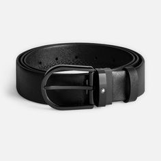 A reliable companion to every ensemble, this 3.5 x 120 cm belt is crafed on an elegant Saffiano-printed leather. To further enhance the refined feel, the leather strap is complemented by a horseshoe buckle and adorned with a subtle Montblanc emblem. Designer Formal Belt With Removable Feature, Designer Formal Belt With Removable Buckle, Designer Formal Belts With Removable Belt, Designer Formal Belts With Rectangular Buckle, Luxury Business Belts With Removable Belt, Timeless Leather Belts For Office, Timeless Leather Belt For Office, Timeless Black Belt, Elegant Leather Belt For Semi-formal Occasions