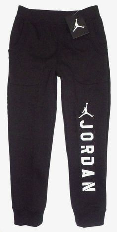 BRAND NEW WITH TAGS- NWT FAST SHIPPING (USPS) Please be sure to read the description thoroughly! Final Sale - No Returns Nike Air Jordan Jumpman Little Boys Nike Air Jordan Jumpman Fleece Lined Athletic Jogger Sweat Pants- (Little Kid- 7) (Nike Tag AGE: 6-7 YRS.)  Age is approx. Features 20" Inseam - Jogger Style Cuffs - Elastic Waistband with Internal Drawcord - Ribbed  Waistband & Cuffs - Side Slant Pockets Fleece Lined - Cotton Blend Material - White Jumpman & "Jordan" Logo down left leg Back Black Fleece Bottoms With Pockets, Nike Black Pants For Streetwear, Nike Casual Bottoms With Letter Print, Casual Nike Bottoms With Letter Print, Casual Black Nike Sweatpants, Black Fleece Pants For Streetwear, Black Sweatpants With Pockets For Leisure, Black Leisure Sweatpants With Pockets, Nike Black Cotton Sweatpants