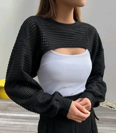 a female mannequin wearing a black and white top