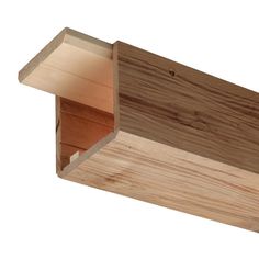 a close up of a wooden shelf with a white background