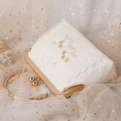 Brand Name: KylethomaswMain Material: Cotton FabricShape: FrameLining Material: CottonPattern Type: FloralStyle: Chinese StyleInterior: Cell Phone PocketOccasion: PartyDecoration: LaceDecoration: EmbroideryModel Number: GY-BCLH394Hardness: SoftGender: WOMENClosure Type: Hasp White Embroidered Rectangular Evening Bag, White Embroidered Top Handle Bag, Elegant Embroidered Square Shoulder Bag, Elegant Square Embroidered Shoulder Bag, Beige Embroidered Rectangular Evening Bag, Embroidered Cream Rectangular Clutch, Cream Embroidered Rectangular Clutch, White Embroidered Handheld Evening Bag, Vintage White Embroidered Bags