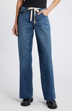 A ribbon tie at the waistline adds a charming detail to these baggy, full-length wide-leg jeans made from nonstretch denim. 33" inseam; 10 1/2" front rise Zip fly with button closure; drawstring waist Five-pocket style 100% cotton Machine wash, tumble dry Imported Casual Denim Bottoms With Tie Waist, Casual Wide Leg Pants With Tie Waist, Baggy Wide Leg Jeans, Ribbon Tie, Wide Leg Jeans, Bottoms Pants, Jeans Pants, Drawstring Waist, Leg Jeans