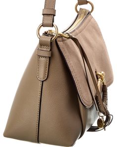 About The Brand: 70S-Inspired Romantic Style. Leather Shoulder Bag In Beige Calf Leather And Gold-Tone Hardware With Tassel Trim, Gold Chain Detail Interior Design Details: Inside Pocket Measures 11.4In Wide X 7.8In High X 5.5In Deep Top Handle Drops 16In Adjustable Strap Drops 18.8 - 21.2In Zipper Closure Made In Italy Please Note: All Measurements Were Taken By Hand And Are Approximate; Slight Variations May Occur. Balenciaga Designer, 70s Inspired, Women Men Shoes, See By Chloe, Romantic Style, Gold Chain, Inside Pocket, Leather Shoulder Bag, Top Handle