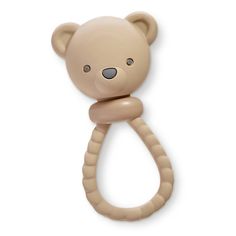 a beige bear shaped teethpick on a white background