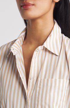 A wardrobe staple, this refined button-up shirt emboldened with stripes is the perfect go-to for wear anywhere. Front button closure Spread collar Long sleeves with button cuffs Chest patch pocket 100% polyester Dry clean Imported Classic Striped Blouse With Shirttail Hem, Vertical Stripes Button-up Workwear Shirt, Striped Shirt With Spread Collar For Work, Striped Spread Collar Blouse For Work, Striped Collared Blouse With Placket, Striped Blouse With Spread Collar For Work, Striped Collared Shirt With Placket, Striped Button-up Blouse For Business Casual, Collared Striped Shirt For Daywear