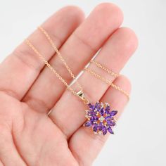 This enchanting 14K Yellow Gold Amethyst and Diamond Flower Charm Rolo Link Necklace is a stunning addition to any jewelry collection. Featuring a beautifully crafted flower charm adorned with vibrant amethyst and sparkling diamonds, this necklace exudes elegance and charm. Weight: 4.1gMaterial: 14K Yellow GoldLength: 18"Width: 1 mmClosure: Spring Ring ClaspPendant: 1" x 0.7" Diamonds: 1 = 0.01CtwColor And Clarity: H/I1Amethyst: 14 x 0.10Ctw = 1.40CtwTotal Carat Weight: 1.41Ctw For more of our jewelry products, please visit our shop 777jewelryLA Free shipping on all orders within USA.International shipping available. We only sell real gold jewelry. We do not sell gold plated or gold filled jewelry. We offer a 30 day money back guaranteed return on all orders. Our goal is to make every cust Elegant Lavender Flower Shaped Jewelry, Purple Flower-shaped Jewelry For Weddings, Purple Gemstone Flower Pendant Necklace, Elegant Flower Shaped Amethyst Jewelry, Purple Flower Charm Wedding Jewelry, Amethyst Flower Pendant Jewelry For Gift, Amethyst Flower Pendant Jewelry Gift, Lavender Flower Shaped Jewelry For Gift, Lavender Flower Shaped Jewelry Gift