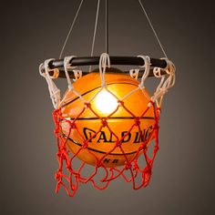 a basketball hanging from a light fixture