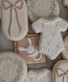 baby girl cookies decorated with fondant and icing