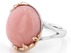 16x12mm oval pink opal rhodium and 18k rose gold over sterling silver solitaire ring. Measures approximately .55"L x .68"W. Not sizeable. Finished under gallery. Elegant Pink Opal Ring In Sterling Silver, Elegant Pink Opal Sterling Silver Ring, Elegant Oval Pink Opal Ring, Anniversary Pink Opal Oval Ring, Elegant Pink Opal Ring Jewelry, Formal Pink Oval Opal Ring, Elegant Pink Opal Ring, Pink Oval Opal Ring In Sterling Silver, Pink Oval Cabochon Opal Ring