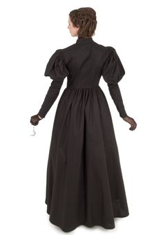 This is our top selling dress! Throughout the Victorian period, mourning would take place for two and a half years! During the first year, black was the only color worn by a widow. This mourning gown in all black has the silhouette of a classic Victorian style. The dress has a fitted waist with a V-shape in front. This dress has leg-o-mutton sleeves and a full skirt. Dress has high collar and front button closure. All in black, this dress is suitable for any woman in mourning. Hand wash or machi Black Victorian Dress, Witch Style, Witch Dress, Couture Bridal Gowns, Dress Tutorials, Period Outfit, Full Skirts, Victorian Clothing, Clothing Details