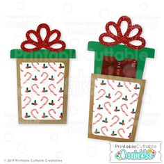 two christmas gift bags with bows and candy canes