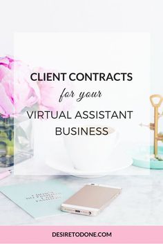 a desk with pink flowers and a phone on it that says client contacts for your virtual assistant business