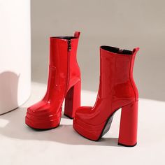 Introducing our newest arrivals ââ‚?the Red Platform Boots! A chic and stylish twist on the classic platform boot. these square-toe beauties are perfect for making a statement. The lush patent leather and chunky block heel add a touch of luxury. while the green hue is perfect for standing out from the crowd. Upper: Patent Leather Lining: Short Plush Outsole: Rubber Toe: Square Toe Closure: Zip Heel: 14cm/5.5'' Platform: 4cm/1.5'' Shaft: 13.5cm/5.3'' Circumference: 25cm/9.8'' Color: Green. Black. Red Ankle Platform Boots For Fall, Red High Ankle Platform Boots For Party, Chic Chunky Platform Boots With Square Toe, Chic Platform Boots With Chunky Platform And Square Toe, Red High Ankle Platform Boots For Fall, Trendy Mid-calf Boots With Chunky Platform And High Heel, Trendy Patent Leather Heeled Boots For Party, Fall Party Patent Leather Platform Boots, Red High Heel Platform Boots