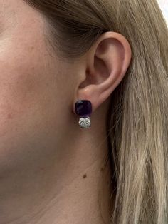 Pair of 18k gold Pomellato Nudo earrings, with amethyst and approx. 0.90ctw G/VS diamonds. Brand new, old stock. Just purchased inventory of a high end boutique in Europe. All retail prices displayed on the items are from the early 2000s. Current retail prices are significantly higher. DESIGNER: Pomellato MATERIAL: 18k Gold GEMSTONES: Diamond, Amethyst DIMENSIONS: Earrings are 23mm x 12.5mm. MARKED/TESTED: Pomellato, 750. WEIGHT: 19.5 grams CONDITION: Brand New/ Store Sample Luxury Amethyst Earrings For Formal Occasions, Purple Fine Jewelry Earrings For Formal Occasions, Luxury Purple Earrings For Evening, Luxury Purple Earrings For Anniversary, Formal Purple Diamond Earrings, Elegant Purple Jewelry With Pave Setting, Elegant Purple Earrings With Diamond Accents, High End Boutique, Elizabeth Locke