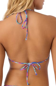 Head straight to the beach in this bikini top featuring a vibrant print and adjustable ties for a perfect fit. Ties at neck and back 85% recycled polyamide, 15% elastane Hand wash, dry flat Imported Adjustable Tropical Multicolor Swimwear, Adjustable Tie Back Swimwear For Beach Season, Adjustable Tie-back Swimwear For Beach Season, Adjustable Multicolor T-back Swimwear, Adjustable Tie-back Strappy Swimwear, Adjustable Tie-back T-back Swimwear, Adjustable Tie Back Swimwear For Beach Party, Adjustable Tie-back Swimwear For Beach Party, Multicolor Halter Neck Swimwear With Tie Back