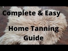 the complete and easy home tanning guide is on top of a wooden floor with text overlay