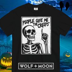 Grab this creepy cute vintage-look oversized t shirt in time for Halloween!  Our durable Comfort Colors "spooky vibes" skeleton tee makes the perfect gift for her or him. Enjoy classic tshirt styling that is perfect for a comfy casual and laid-back look.  The attention-grabbing original design will reveal to the "dreadful" world your funny AND dark sense of humor. "Creep It Real!" 💡 𝗙.𝗬.𝗜.: At Wolf+Moon, we're on a mission to blend comfort, quality, and adventure seamlessly. That's why Comfo Halloween Concert T-shirt With Screen Print, Gothic Skull Print T-shirt For Fall, Spooky Skull Print T-shirt For Streetwear, Gothic Short Sleeve T-shirt For Halloween, Halloween Concert Skull Print Tops, Halloween Skull Print Top For Concert, Halloween Skull Print Tops For Concert, Halloween Alternative Fashion T-shirt With Letter Print, Halloween T-shirt With Screen Print For Alternative Fashion