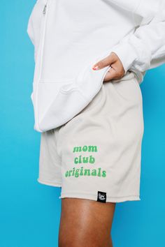 Mom Club Original Sweatshirts with a happy face :) This soft, drawstring short features raw edges and a relaxed fit that hits above the knee for chill vibes. Also available in Black! Features: Raw Edge Hem, Relaxed Fit, Longer Length Fabrication: 52% Airlume combed and ring-spun cotton, 48% polyester fleece, 32 single, 7.0oz. Cotton Leisure Shorts With Letter Print, Relaxed Fit Comfortable Shorts For Streetwear, Comfortable Relaxed Fit Shorts For Streetwear, Trendy Loose Cotton Shorts, Relaxed Fit Shorts With Letter Print For Leisure, Relaxed Fit Leisure Shorts With Letter Print, Relaxed Fit Letter Print Shorts For Leisure, Cozy Cotton Leisure Shorts, Cotton Relaxed Fit Shorts With Letter Print