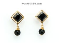 22 karat gold drop earrings for women with black stones & black beads

introducing our exquisite 22 karat gold drop earrings for women, meticulously crafted in india by totaram jewelers. these stunning earrings are designed to elevate your style and add a touch of elegance to any outfit.
  
  made with the finest quality 22 karat gold, these earrings are a true testament to the skill and craftsmanship of indian artisans. the intricate design features black stones and black beads, add Traditional Black Earrings For Formal Occasions, Black Stone Earrings Gold Indian, Elegant Black Danglers For Gift, Gold Black Beads, 22k Gold Earrings, Black Stone Earrings, Ear Drops, Black Stones, Gold Jewelry Indian