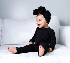 Our newest "Black solid" made from the softest and most breathable bamboo viscose material, your babe won't want to take this off! Designed for all the love and extra snuggles! Sleep and play with zero irritation with our tag-less garment tags! Can't miss our fold over hand cuffs and footie option for the perfect transition to sleep! Easy diaper changes, you got it-made with a double zipper feature. We promise you'll love it! All dreamyZzz items are snug fit to meet CPSC compliance Sizes availab Soft Fitted Onesie For Playtime, Black Fitted Onesie For Loungewear, Playful Fitted Black Onesie, Black Fitted Playful Onesie, Fitted Black Onesie For Playtime, Soft Fitted Onesie For Loungewear, Fitted Onesie For Sleep, Fitted Solid Color Onesie For Sleep, Black Fitted Onesie For Playtime