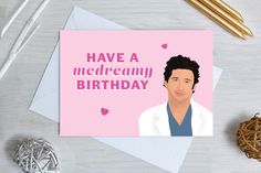 a card with the words have a medreamy birthday on it next to some knitting needles