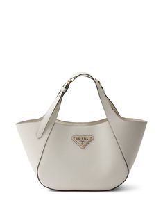 white calf leather enamel triangle logo two adjustable top handles magnetic fastening internal zip-fastening pocket internal logo stamp leather lining gold-tone hardware rectangle body White Prada Bag, Denim Bags From Jeans, Prada Leather Tote, Neutral Bag, Prada Tote Bag, Embroidered Tote Bag, Minimalist Silhouette, Minimalist Bag, Embroidered Tote