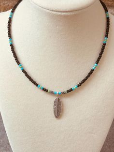 Boho feather black and turquoise beaded choker. Bohemian Beaded Turquoise Choker, Bohemian Turquoise Choker With Tiny Beads, Bohemian Black Bead Choker, Bohemian Black Beaded Choker, Black Bohemian Choker, Boho Feathers, Crystal Lake, Beaded Choker, Choker Necklaces