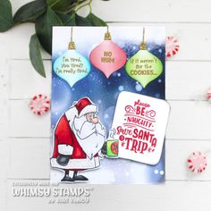 a christmas card with santa holding a cup