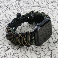 "➖ Handcraft Paracord 550 ➖ Designed for Apple Watch 42/44/45/49mm - Series 8/7/6/5/4/3/2/1/SE & Ultra ➖ Elite-Quality Shackle: Stainless Steel and Aluminum (No PEE) ➖ Quick and Easy Clip/Release ➖ Breathable and Waterproof Our band is made from premium quality 550 paracord and are designed to replace a stock Apple Watch band. This is a unisex watch accessory . Our designs are meant to be stylish and practical. Simple installation on the Apple Watch. Easy clip and quick release. SIZE (From 6\" t Wear-resistant Black Apple Watch Band For Outdoor, Black Wear-resistant Apple Watch Band For Outdoor, Adjustable Black Apple Watch Band For Outdoor, Wear-resistant Adjustable Apple Watch Band For Outdoor, Adjustable Wear-resistant Apple Watch Band For Outdoor, Black Paracord Watch Accessories For Outdoor, Adjustable Paracord Watch Bands For Outdoor, Durable Adjustable Watch Bands For Outdoor, Outdoor Black Paracord Watch Accessories