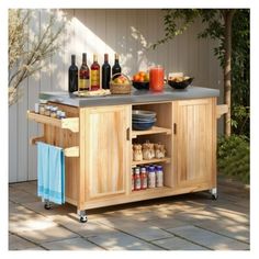 a kitchen island with food and drinks on it