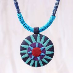 The Hmong sun medallion comes to life in on the pendant of this cotton necklace. Patchwork in blue purple and red create this important motif. Circling the neck with adjustable cord decorated in the batik style this classic Thai hill tribe design comes from Nulee. Sun Medallion, Thailand Gifts, Tribe Design, Cotton Jewelry, Cotton Necklace, Travel Necklace, Pretty Design, Jewelry Packaging, Jewelry Gift Box